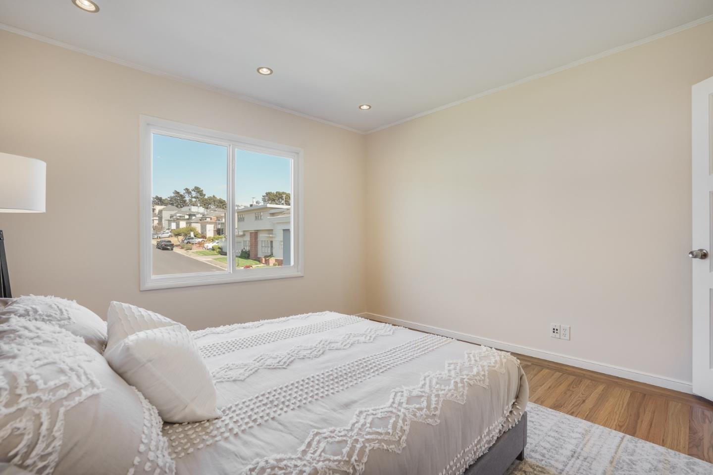 49 Sheffield Drive Daly City, CA 94015 - Photo 35 of 55 a bedroom with a bed and a window