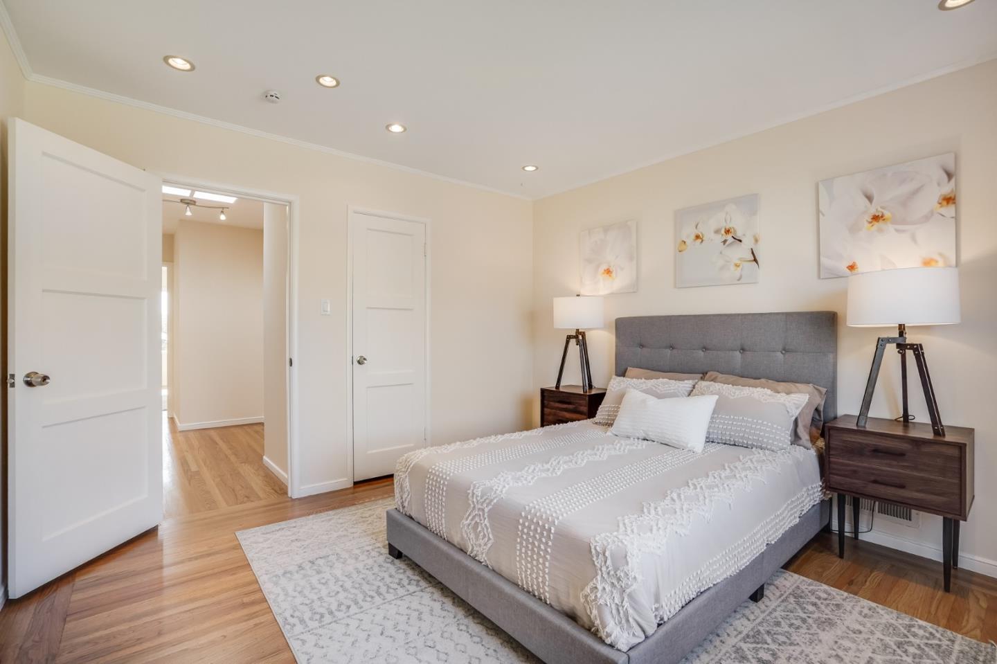 49 Sheffield Drive Daly City, CA 94015 - Photo 36 of 55 a bedroom with a bed and a lamp on table