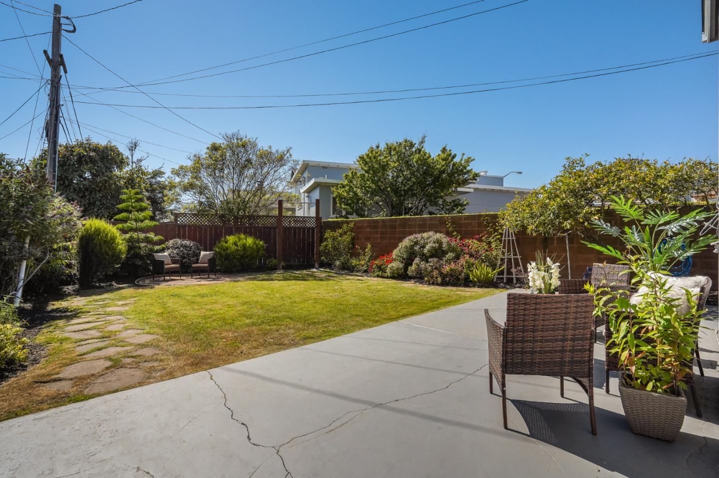 49 Sheffield Drive Daly City, CA 94015 - Photo 40 of 55 a view of a chair and table in the backyard