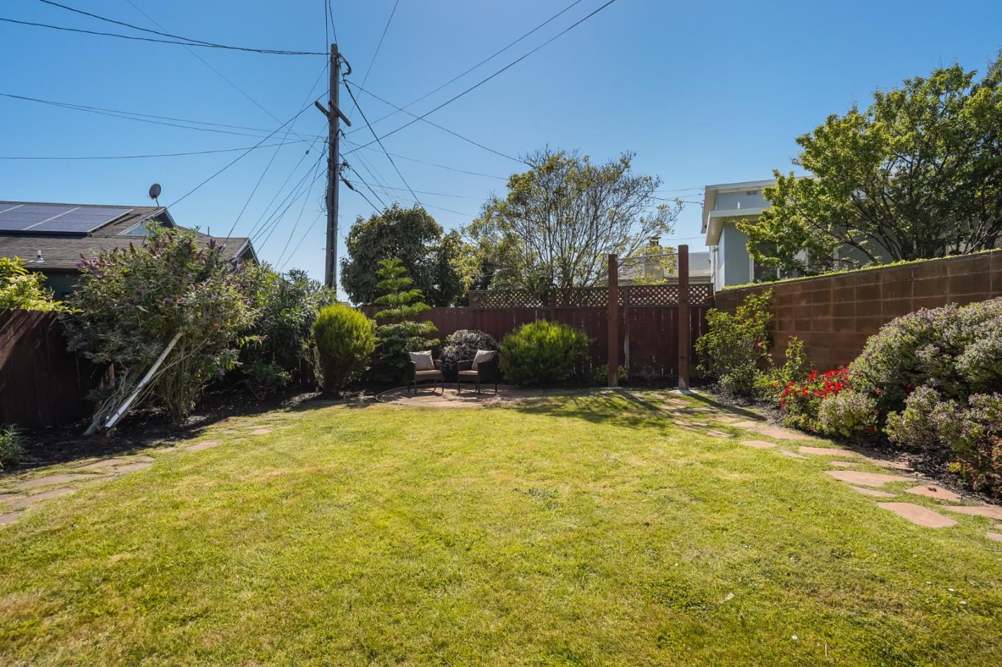 49 Sheffield Drive Daly City, CA 94015 - Photo 42 of 55 a yellow house with trees in front of it