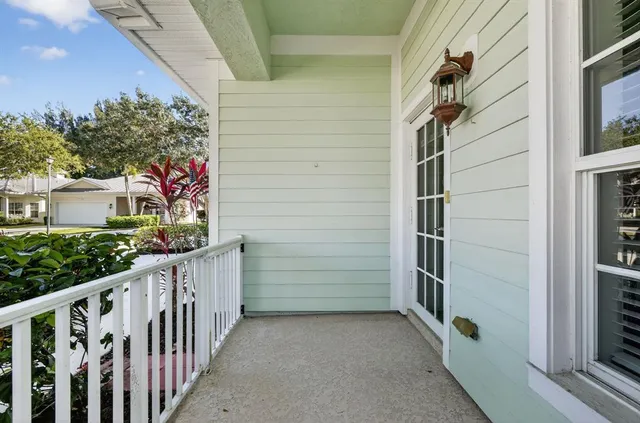 an empty room with a empty space and chandelier fan