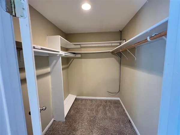 a bathroom with a sink a toilet and bathtub