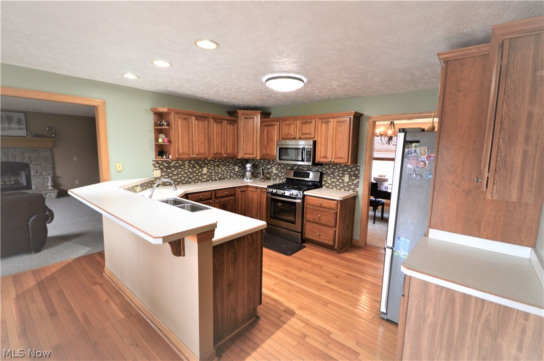 4112 Logans Way Perry, OH 44081 - Photo 14 of 29 Kitchen opens up into a very cozy family room