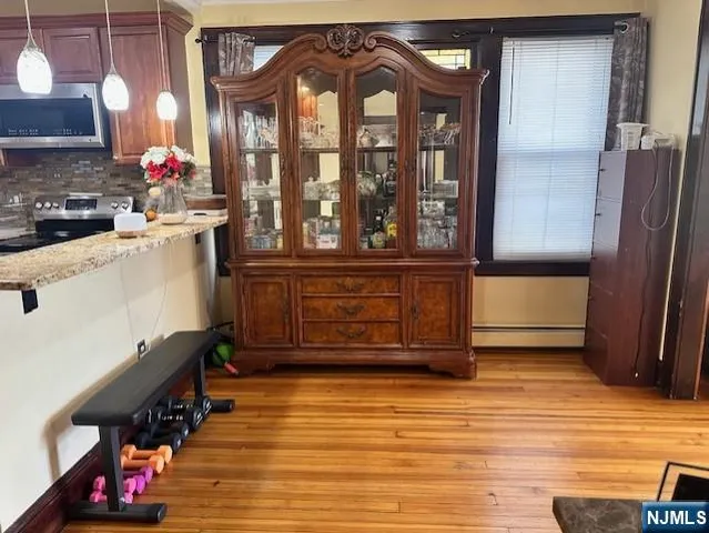 a view of a living room with entryway