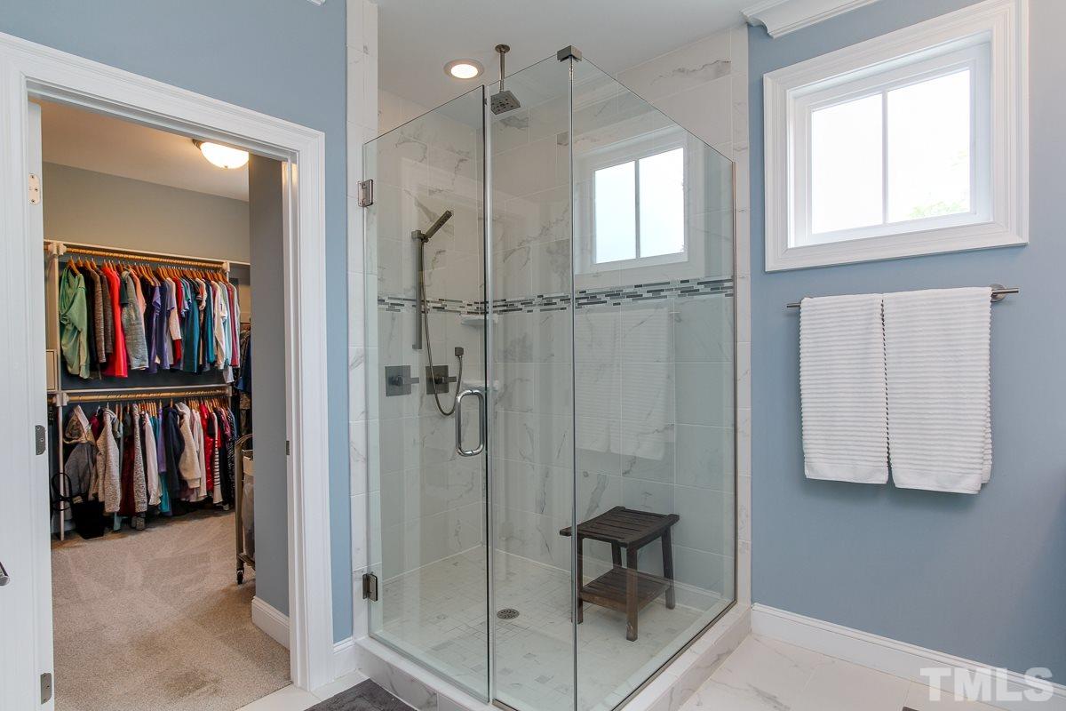 2315 Bedford Avenue Raleigh, NC 27607 - Photo 17 of 25 a bathroom with a shower and a sink
