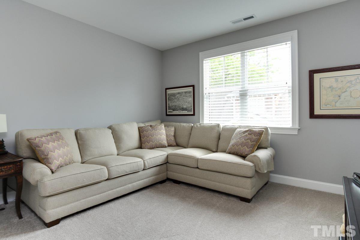2315 Bedford Avenue Raleigh, NC 27607 - Photo 18 of 25 a living room with furniture and a window