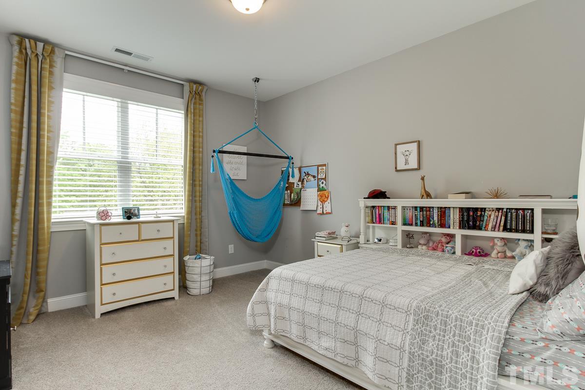 2315 Bedford Avenue Raleigh, NC 27607 - Photo 19 of 25 a bedroom with a bed and a large window