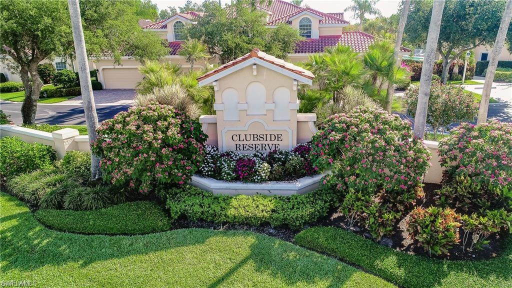 6135 Reserve Circle, Unit 1801 Naples, FL 34119 - Photo 2 of 23 View of community / neighborhood sign