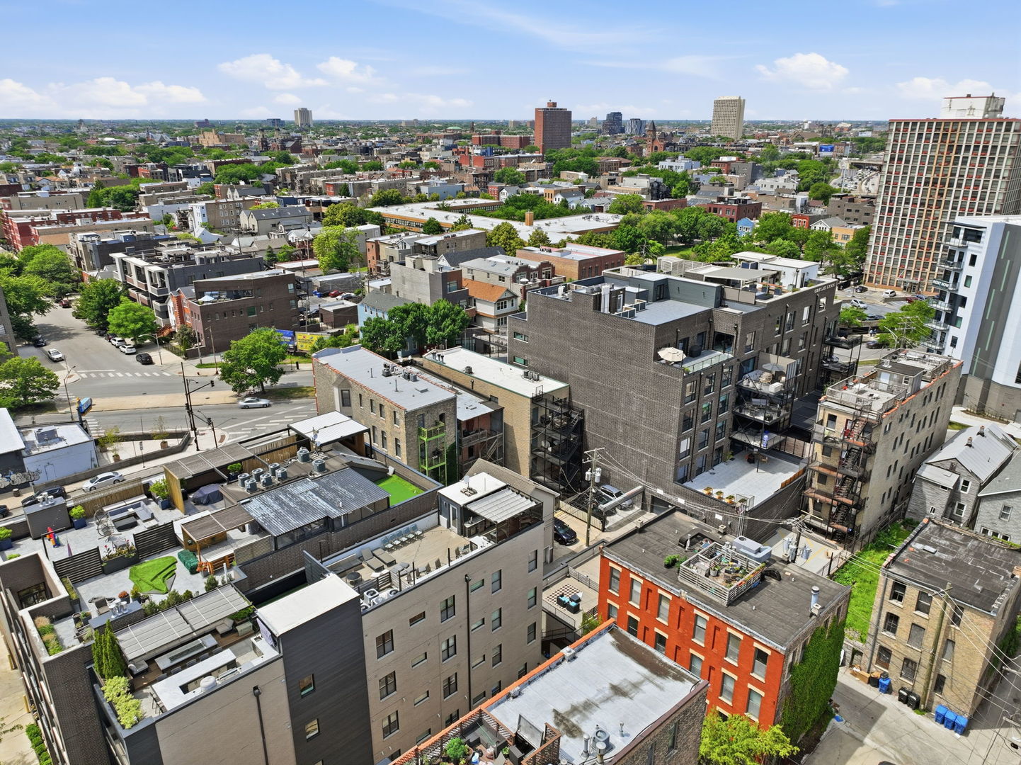 619 North Racine Avenue, Unit 1 Chicago, IL 60642 - Photo 34 of 36 an aerial view of a city with lots of residential buildings