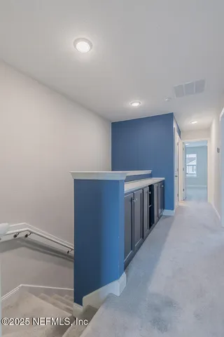 a view of a kitchen with a sink