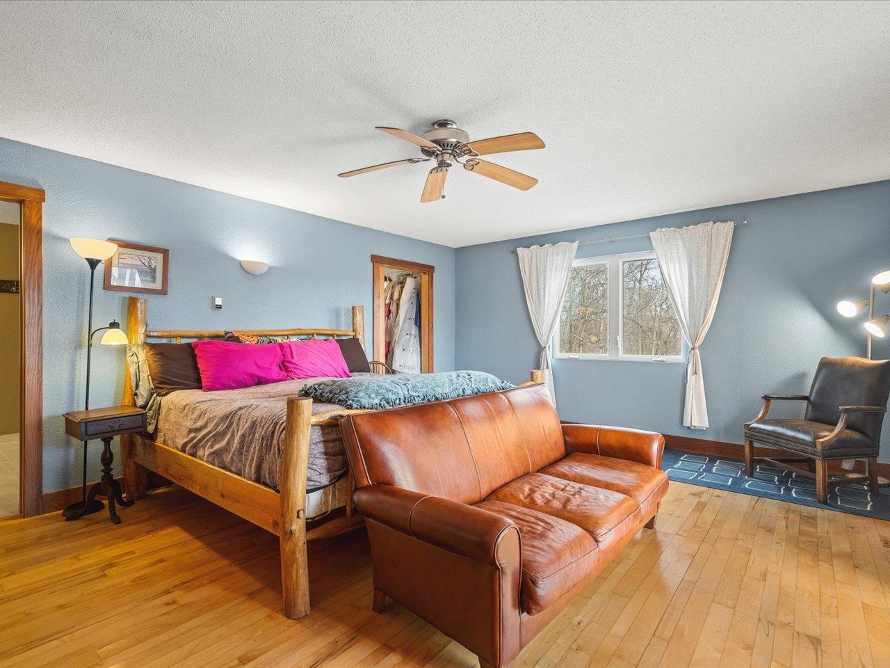 11660 Farm School Road Durand, IL 61024 - Photo 16 of 47 a bedroom with a bed and window