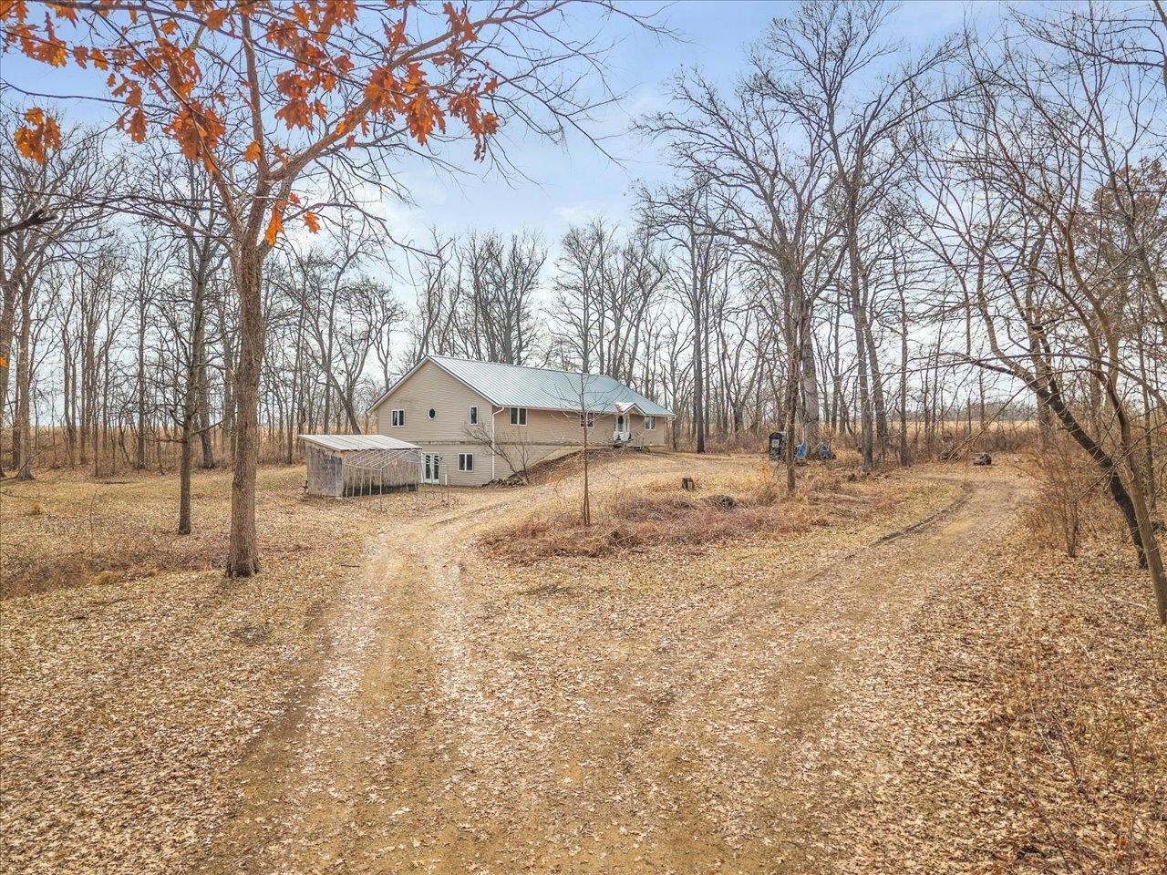 11660 Farm School Road Durand, IL 61024 - Photo 2 of 47 a view of empty space with trees