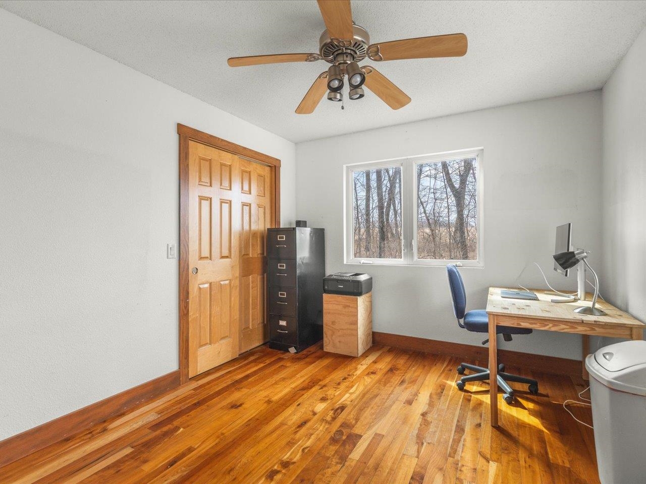 11660 Farm School Road Durand, IL 61024 - Photo 27 of 47 a view of a workspace with furniture and a window