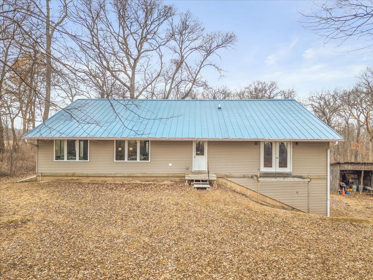 11660 Farm School Road Durand, IL 61024 - Photo 32 of 47 front view of a house with a yard