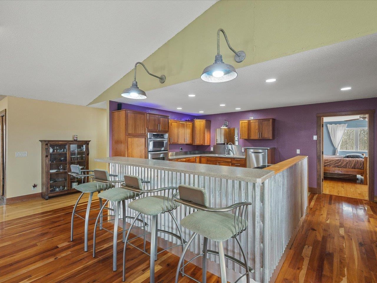 11660 Farm School Road Durand, IL 61024 - Photo 10 of 47 a view of a dining room with furniture and wooden floor