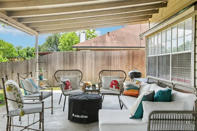 a outdoor living space with furniture and garden view