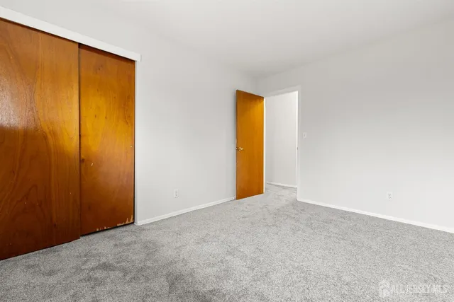 an empty room with a door