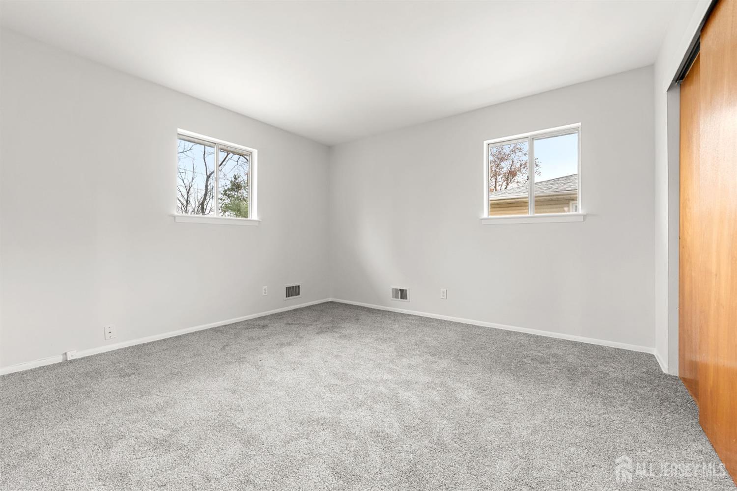 89 Van Buren Avenue, Unit 2 Metuchen, NJ 08840 - Photo 15 of 16 a view of an empty room with a window
