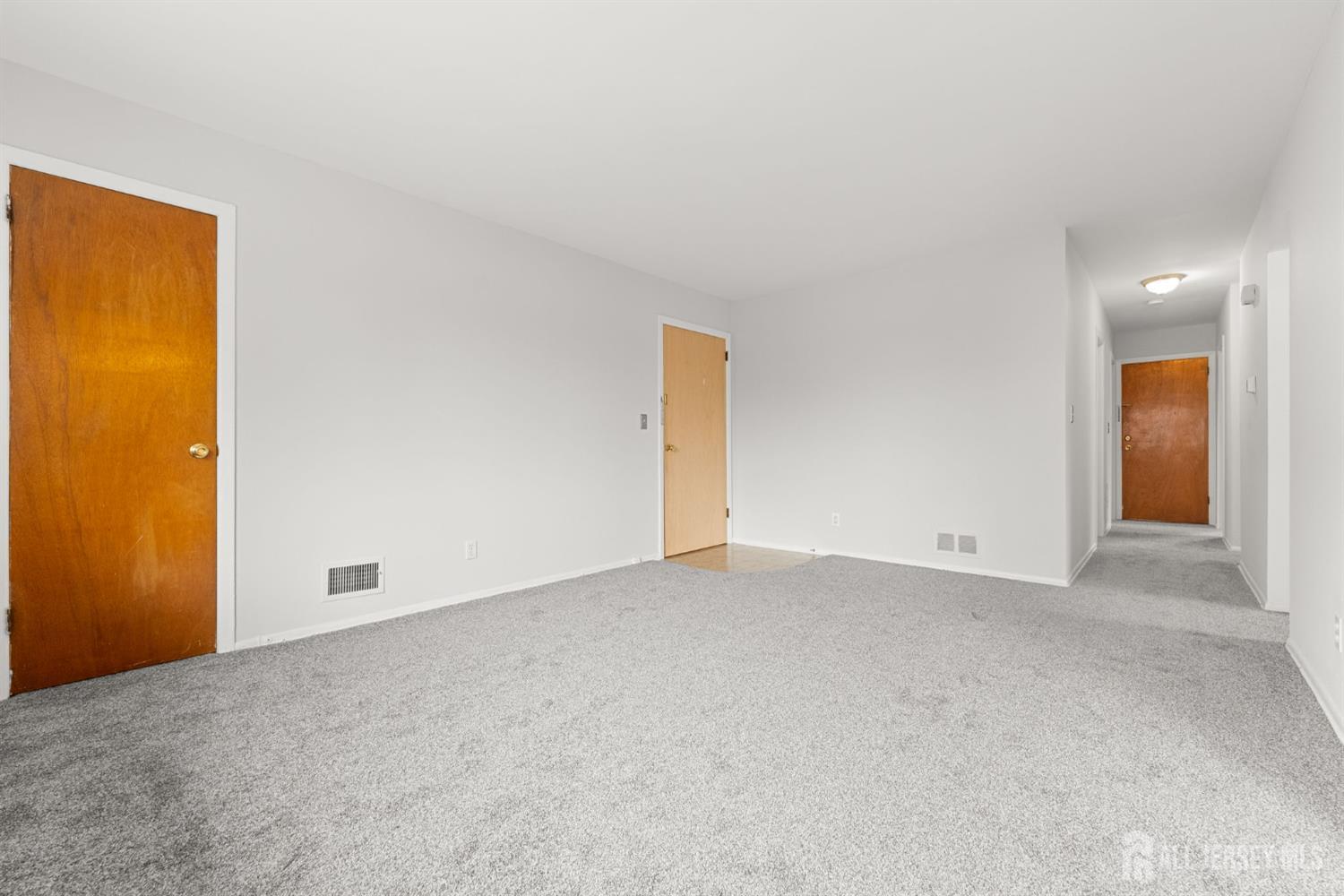 89 Van Buren Avenue, Unit 2 Metuchen, NJ 08840 - Photo 7 of 16 an empty room with window