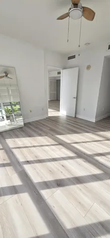 a room with lots of large windows