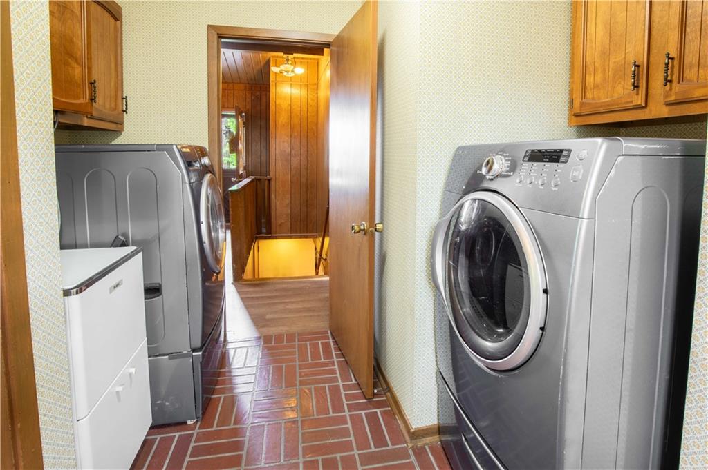 906 Aztec Trail Mercer, PA 16137 - Photo 11 of 27 a utility room with dryer and washer