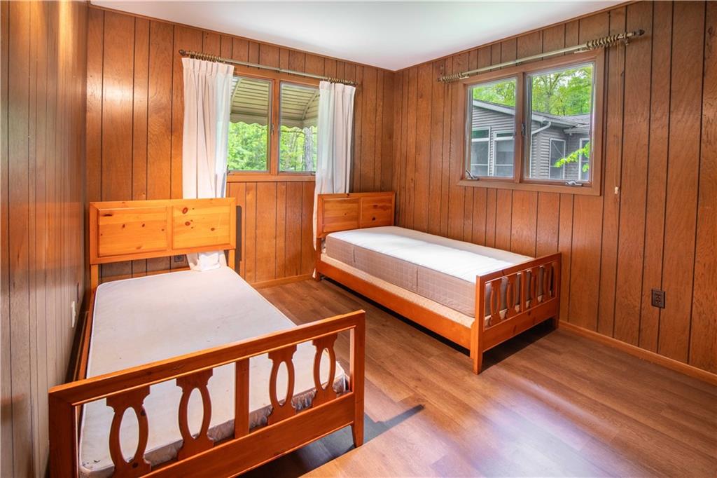 906 Aztec Trail Mercer, PA 16137 - Photo 14 of 27 a bedroom with two beds and a window