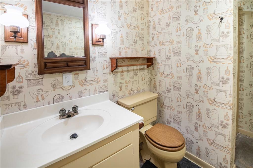 906 Aztec Trail Mercer, PA 16137 - Photo 18 of 27 a bathroom with a sink a toilet and shower