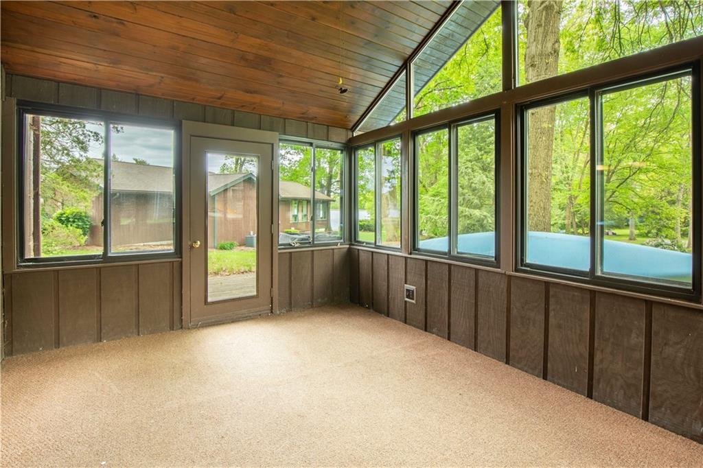 906 Aztec Trail Mercer, PA 16137 - Photo 19 of 27 a view of an empty room with a balcony