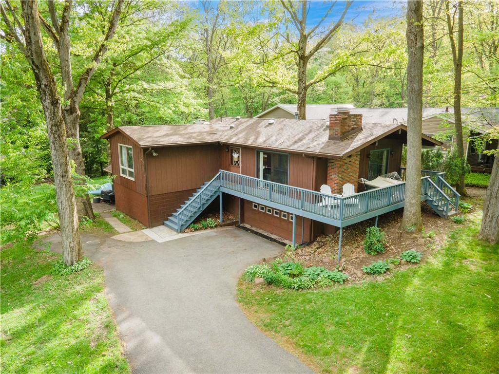 906 Aztec Trail Mercer, PA 16137 - Photo 20 of 27 a view of a house with a yard deck and furniture