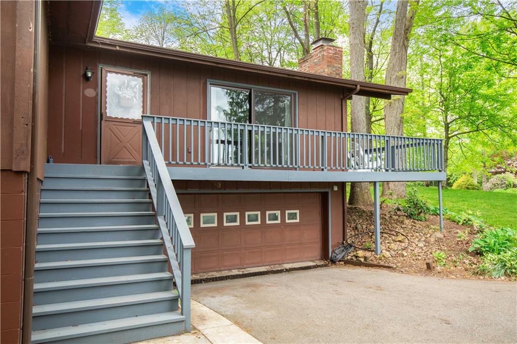 906 Aztec Trail Mercer, PA 16137 - Photo 4 of 27 a view of a house with a balcony