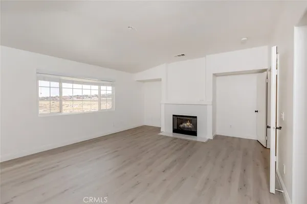 a living room with a fireplace