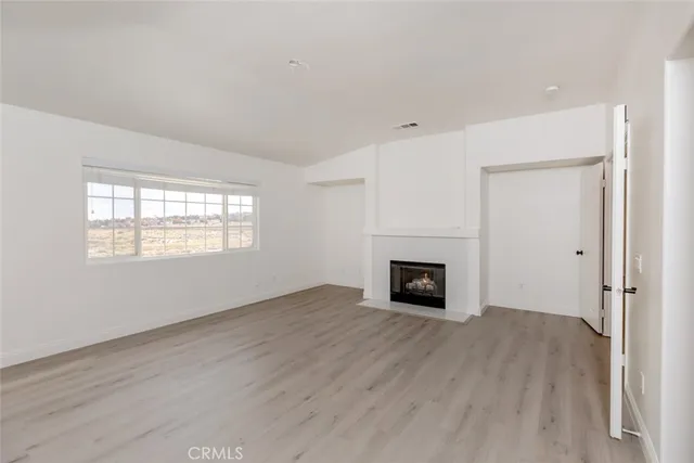 a living room with a fireplace