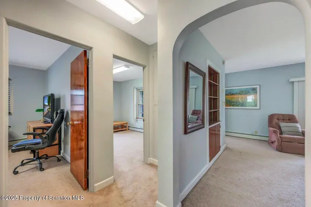 a view of an empty room and window