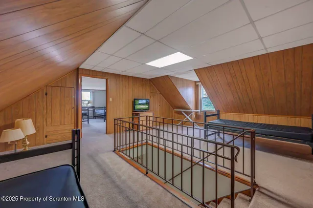 a room with chairs and a piano