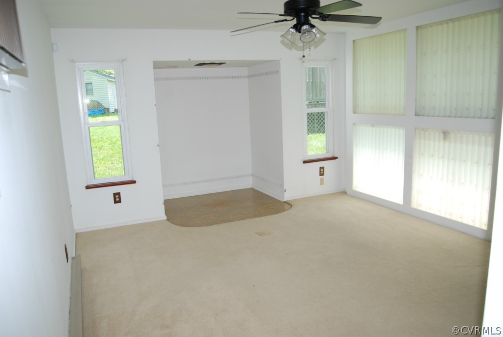 8512 Hann Road North Chesterfield, VA 23236 - Photo 11 of 23 an empty room with a window and a ceiling fan