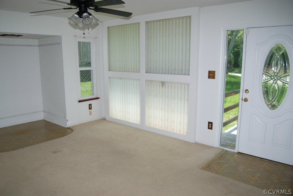 8512 Hann Road North Chesterfield, VA 23236 - Photo 12 of 23 an empty room with windows and entrance