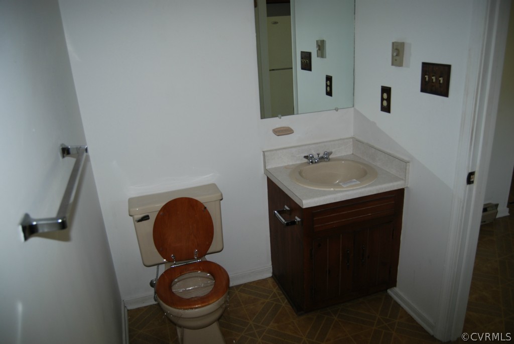 8512 Hann Road North Chesterfield, VA 23236 - Photo 17 of 23 a bathroom with a sink and a toilet