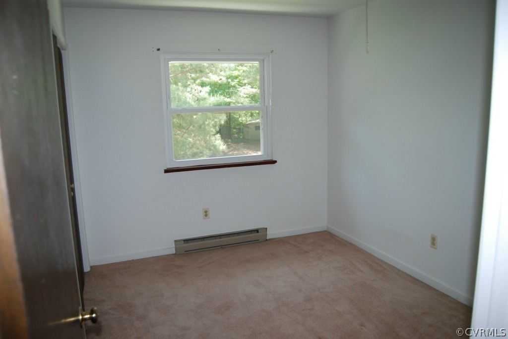 8512 Hann Road North Chesterfield, VA 23236 - Photo 18 of 23 an empty room with a window