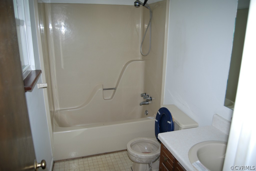 8512 Hann Road North Chesterfield, VA 23236 - Photo 20 of 23 a white toilet sitting next to a bath tub
