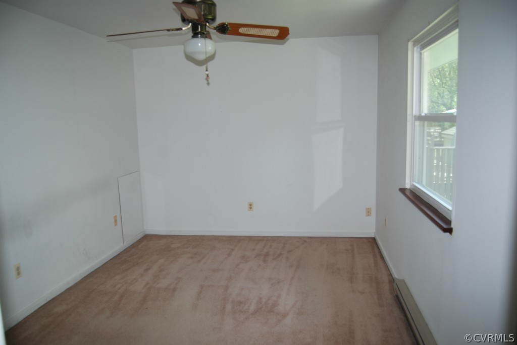 8512 Hann Road North Chesterfield, VA 23236 - Photo 21 of 23 wooden floor in an empty room with a window