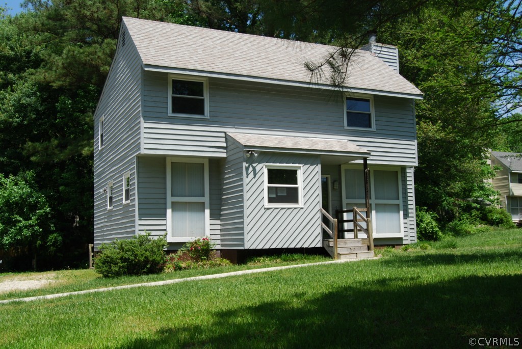 8512 Hann Road North Chesterfield, VA 23236 - Photo 23 of 23 a front view of a house with a yard