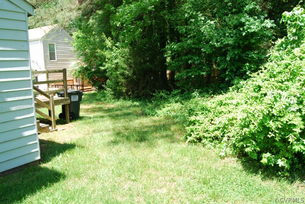 8512 Hann Road North Chesterfield, VA 23236 - Photo 5 of 23 a backyard of a house with seating space