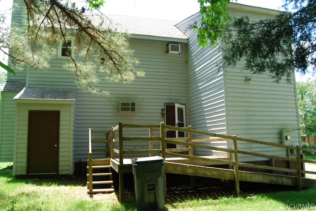 8512 Hann Road North Chesterfield, VA 23236 - Photo 7 of 23 a view of a backyard with chairs and a fire pit