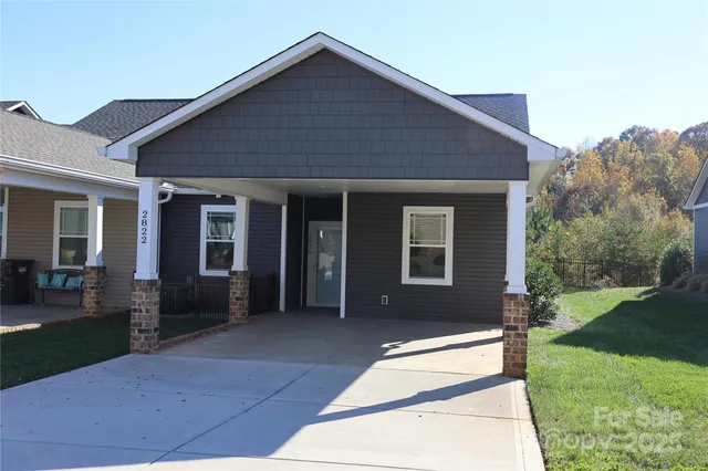 a front view of house with yard