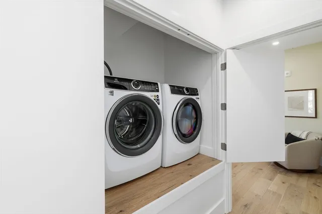 a utility room with dryer and washer