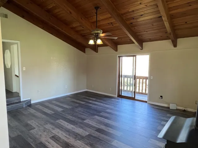a bathroom with a toilet sink and a mirror