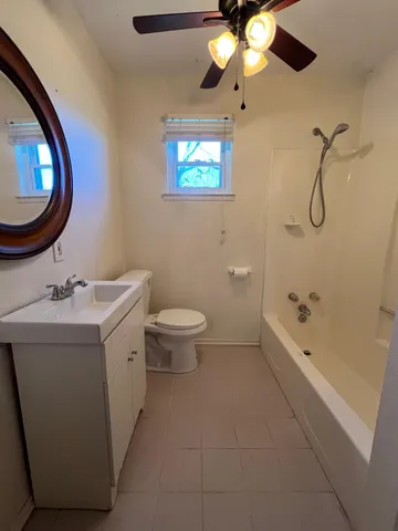 a bathroom with a toilet and a sink