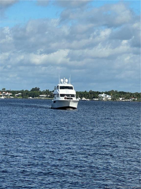 1455 Southeast Riverside Drive Stuart, FL 34996 - Photo 2 of 100 Owner’s 80' deep water yacht on approach to the dock