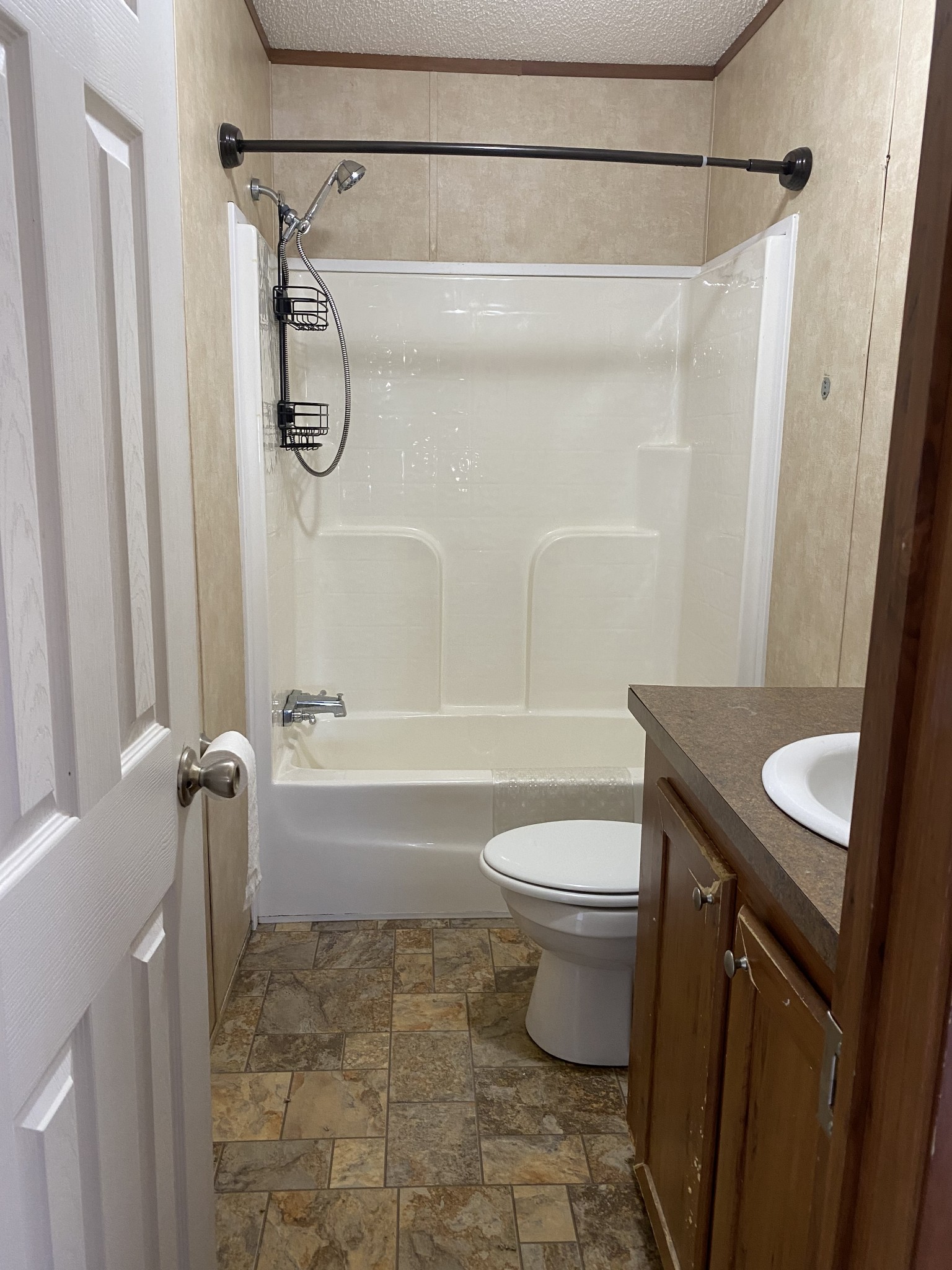 5202 Doss Road Springfield, TN 37172 - Photo 25 of 33 a bathroom with a granite countertop bathtub shower sink vanity and toilet