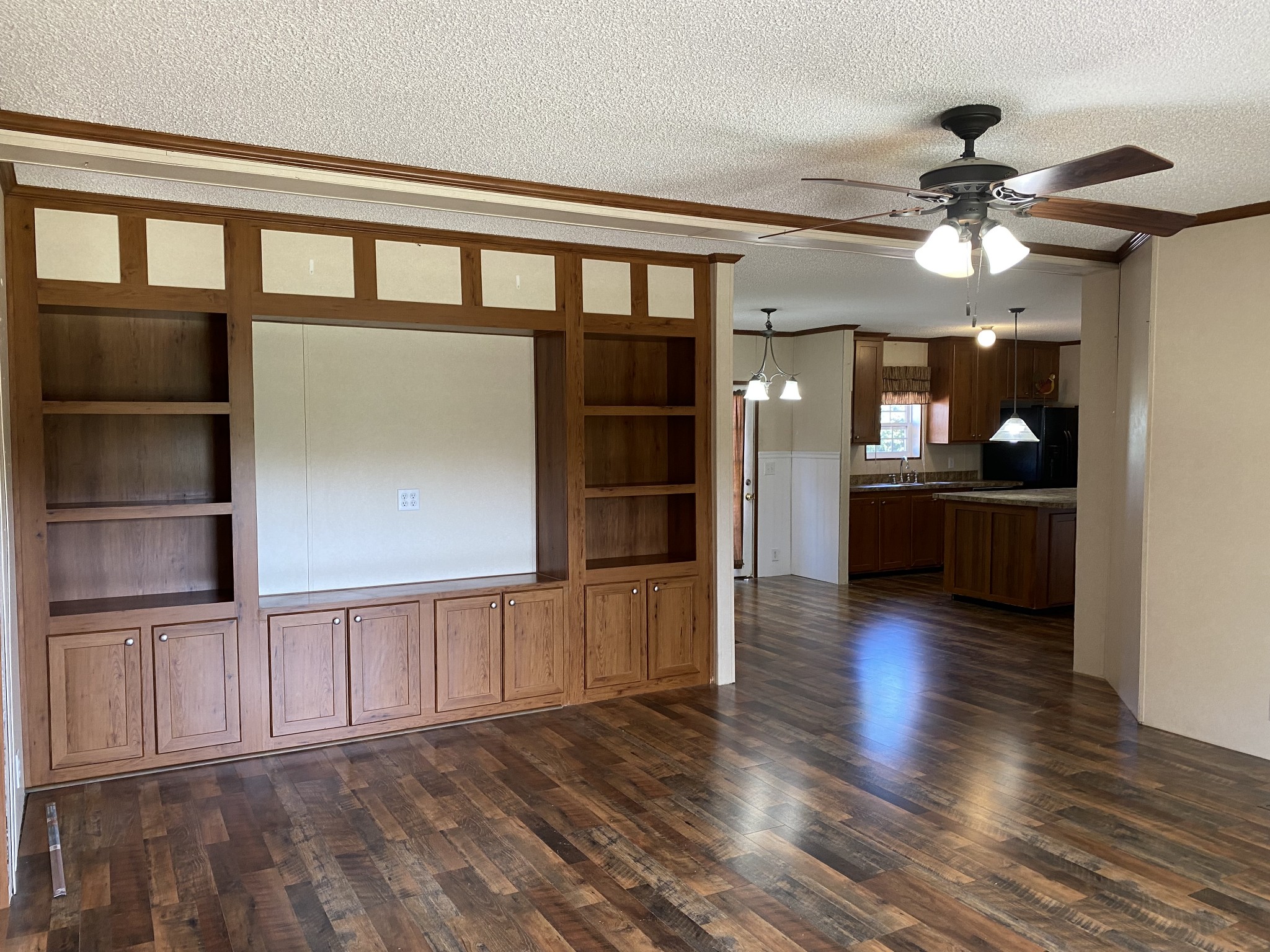 5202 Doss Road Springfield, TN 37172 - Photo 3 of 33 a view of an empty room with a window and wooden floor